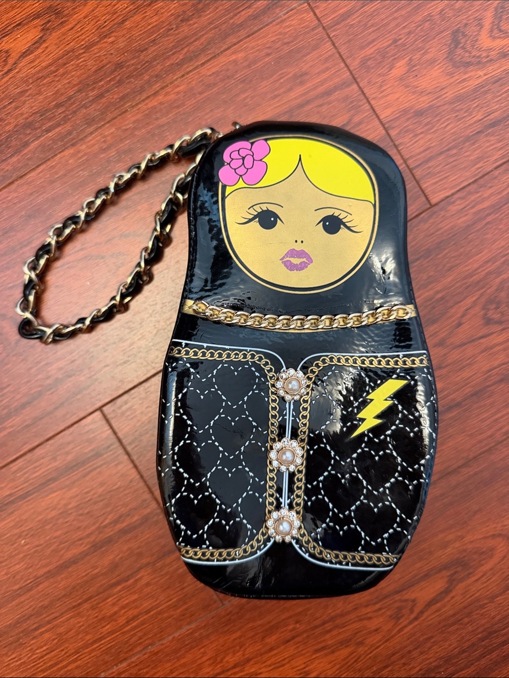 Betsey Johnson Black Patent Doll Face Wristlet with Yellow and Pink Accents